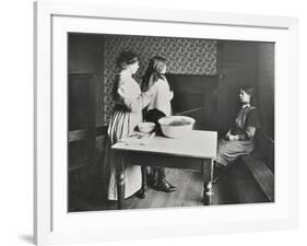 A Nurse Examines Girls Hair, Central Street Cleansing Station, London, 1914-null-Framed Photographic Print