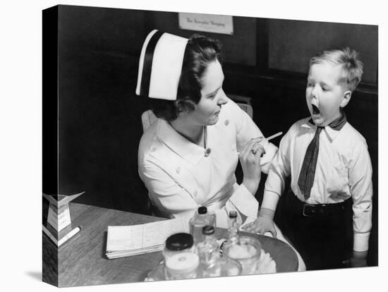 A Nurse Examining the Teeth of a Boy in New York, NY , Ca, 1935-null-Stretched Canvas