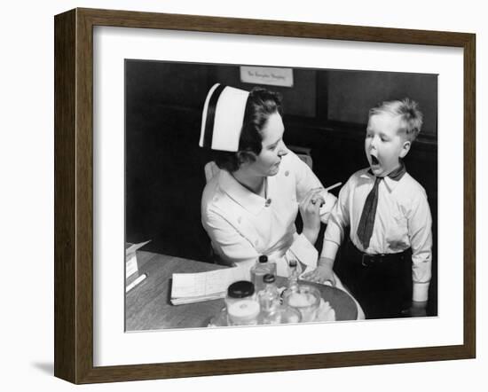 A Nurse Examining the Teeth of a Boy in New York, NY , Ca, 1935-null-Framed Photo