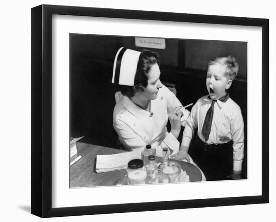 A Nurse Examining the Teeth of a Boy in New York, NY , Ca, 1935-null-Framed Photo