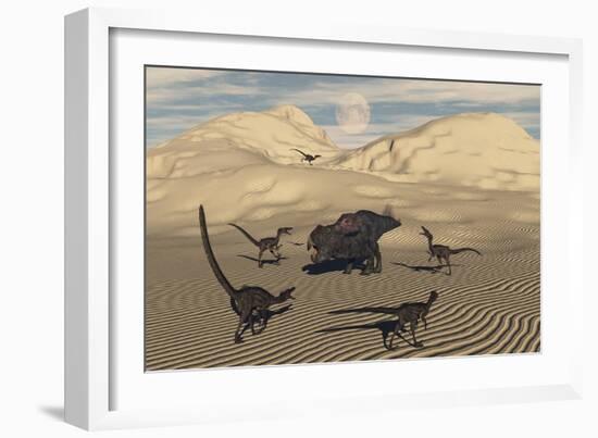 A Pack of Velociraptors Encircling a Lone Protoceratops-null-Framed Art Print