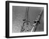 A Painter Lays Across the Rigging While Painting on Sailing Ship-null-Framed Photographic Print