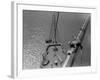 A Painter Lays Across the Rigging While Painting on Sailing Ship-null-Framed Photographic Print