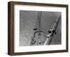 A Painter Lays Across the Rigging While Painting on Sailing Ship-null-Framed Photographic Print