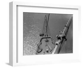 A Painter Lays Across the Rigging While Painting on Sailing Ship-null-Framed Photographic Print