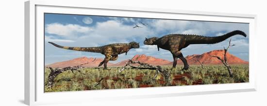 A Pair of Carnotaurus Dinosaurs in a Territorial Dispute-null-Framed Premium Giclee Print