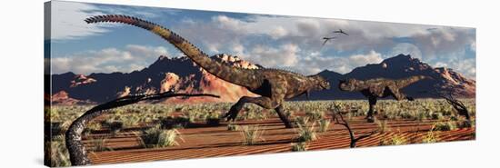 A Pair of Carnotaurus Dinosaurs in a Territorial Dispute-null-Stretched Canvas