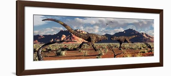 A Pair of Carnotaurus Dinosaurs in a Territorial Dispute-null-Framed Premium Giclee Print