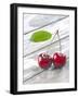 A Pair of Cherries with a Leaf on a Wooden Table-Jürgen Klemme-Framed Photographic Print