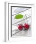 A Pair of Cherries with a Leaf on a Wooden Table-Jürgen Klemme-Framed Photographic Print