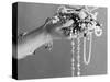 A Pair of Hands Holding All Sorts of Jewellery-null-Stretched Canvas