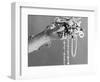 A Pair of Hands Holding All Sorts of Jewellery-null-Framed Photographic Print