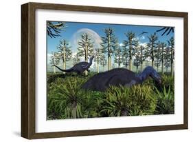 A Pair of Herbivorous Camptosaurus Dinosaurs Grazing-null-Framed Art Print