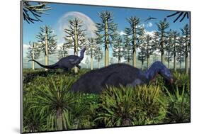 A Pair of Herbivorous Camptosaurus Dinosaurs Grazing-null-Mounted Art Print