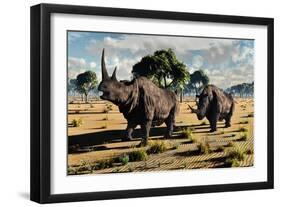 A Pair of Mature Woolly Rhinoceros During the Pleistocene Epoch-Stocktrek Images-Framed Art Print