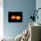 A Pair of Neutron Stars Colliding, Merging, and Forming a Black Hole-null-Art Print displayed on a wall