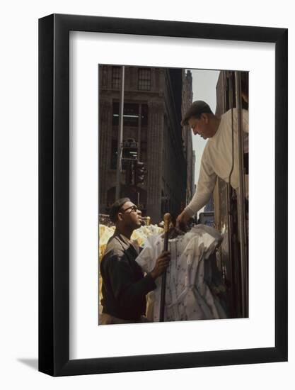 A Pair of Push Boys Unload Racks of Dresses on 7th Avenue, New York, New York, 1960-Walter Sanders-Framed Photographic Print