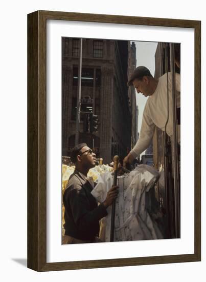 A Pair of Push Boys Unload Racks of Dresses on 7th Avenue, New York, New York, 1960-Walter Sanders-Framed Photographic Print