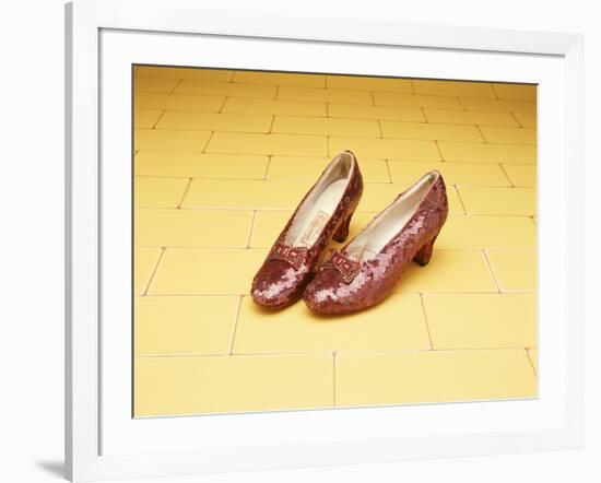 A Pair of Ruby Slippers Worn by Judy Garland in the 1939 MGM film "The Wizard of Oz"-null-Framed Giclee Print