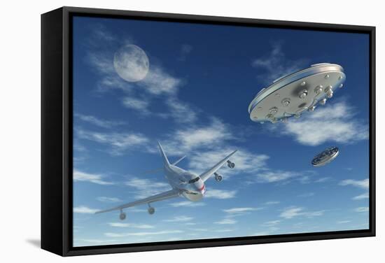 A Pair of Silver Metallic Disc Shaped Ufo's Buzzing a Boeing 747 Commerical Airliner-null-Framed Stretched Canvas