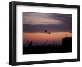 A Pair of UH-60 Black Hawk Helicopters Approach their Landing in Baghdad, Iraq-null-Framed Photographic Print