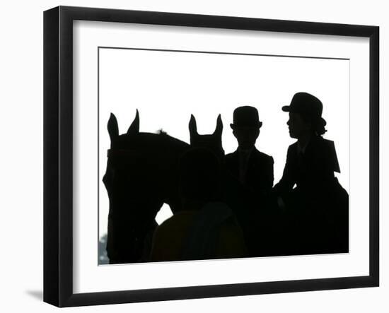 A Pair of Young Girls Wait with Their Horses-null-Framed Premium Photographic Print
