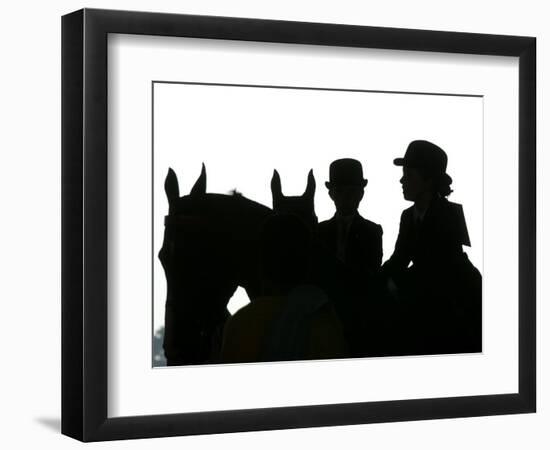 A Pair of Young Girls Wait with Their Horses-null-Framed Photographic Print