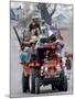 A Pakistan Earthquake Survivor Family Ride a Vehicle as They Make Their Way to Mansehra-null-Mounted Photographic Print