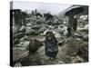 A Pakistani Earthquake Survivor Shivers-null-Stretched Canvas