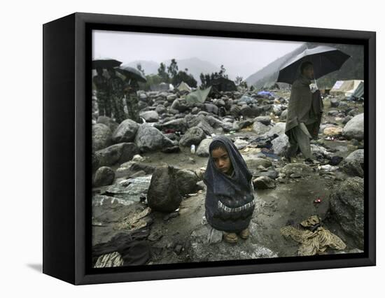 A Pakistani Earthquake Survivor Shivers-null-Framed Stretched Canvas