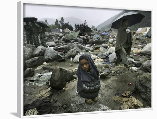 A Pakistani Earthquake Survivor Shivers-null-Framed Photographic Print