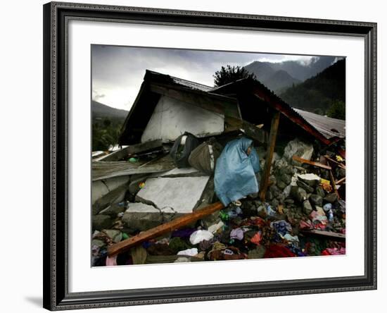 A Pakistani Earthquake Survivor Takes Shelter from the Rain-null-Framed Photographic Print