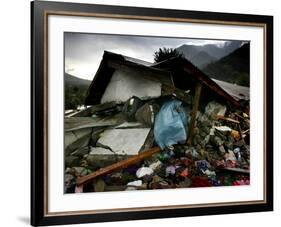 A Pakistani Earthquake Survivor Takes Shelter from the Rain-null-Framed Photographic Print