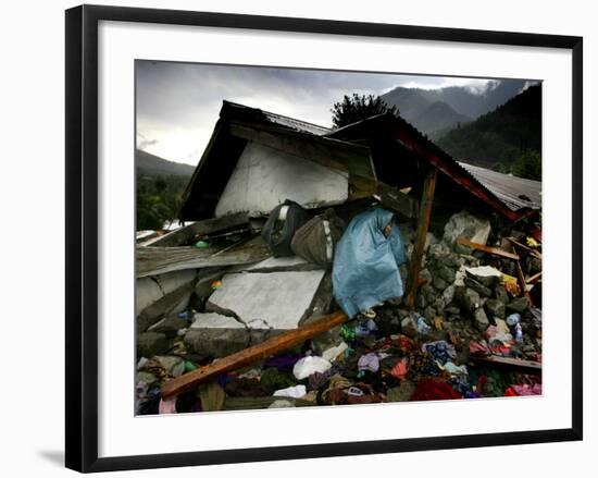 A Pakistani Earthquake Survivor Takes Shelter from the Rain-null-Framed Photographic Print