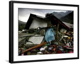 A Pakistani Earthquake Survivor Takes Shelter from the Rain-null-Framed Photographic Print