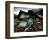 A Pakistani Earthquake Survivor Takes Shelter from the Rain-null-Framed Photographic Print