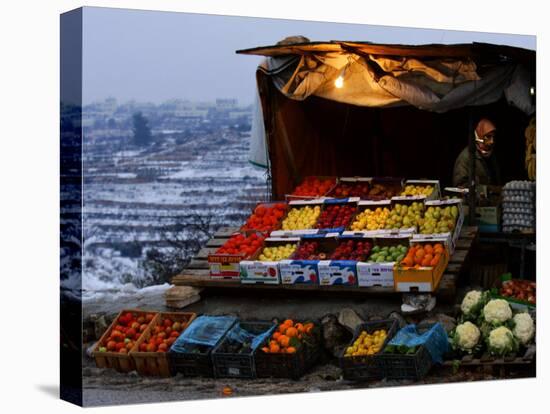 A Palestinian Fruit and Vegetable Vendor Waits for Customers-Kevin Frayer-Stretched Canvas