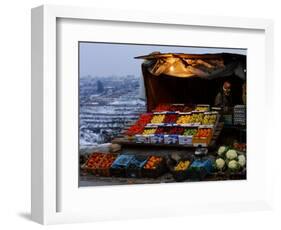 A Palestinian Fruit and Vegetable Vendor Waits for Customers-Kevin Frayer-Framed Photographic Print