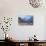 A Panoramic View of Cascading Waterfalls and Mountain Backdrop-Andreas Brandl-Photographic Print displayed on a wall