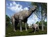 A Paraceratherium Mother Grazes on Leaves and Twigs of a Poplar Tree-Stocktrek Images-Mounted Photographic Print