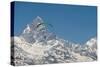 A Paraglider Hangs in Air with Dramatic Peak of Machapuchare (Fishtail Mountain) in Distance-Alex Treadway-Stretched Canvas