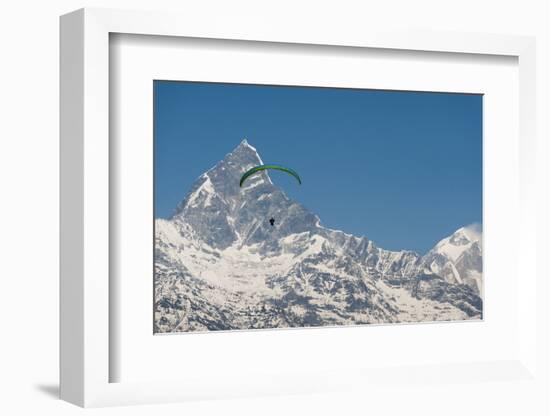 A Paraglider Hangs in Air with Dramatic Peak of Machapuchare (Fishtail Mountain) in Distance-Alex Treadway-Framed Photographic Print