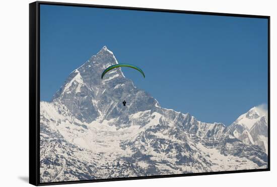 A Paraglider Hangs in Air with Dramatic Peak of Machapuchare (Fishtail Mountain) in Distance-Alex Treadway-Framed Stretched Canvas