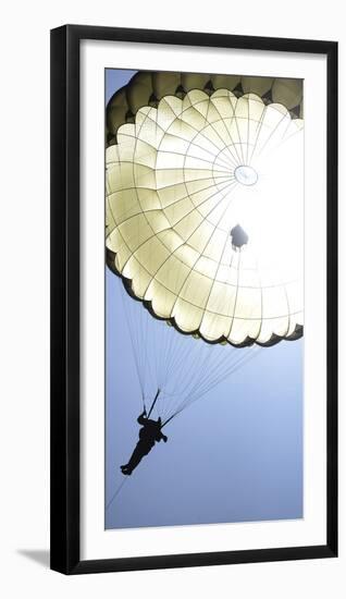 A Paratrooper Descends onto the Drop Zone-null-Framed Photographic Print