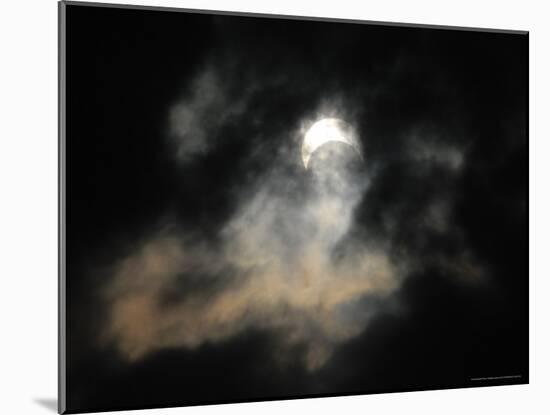 A Partial Solar Eclipse-null-Mounted Photographic Print