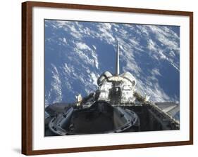 A Partial View of Space Shuttle Atlantis Backdropped by a Blue and White Earth-null-Framed Photographic Print