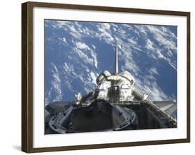 A Partial View of Space Shuttle Atlantis Backdropped by a Blue and White Earth-null-Framed Photographic Print