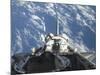 A Partial View of Space Shuttle Atlantis Backdropped by a Blue and White Earth-null-Mounted Photographic Print