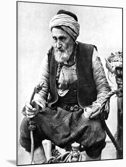 A Peasant Drinking Coffee and Smoking a Huqqah, Izmir, Turkey, 1936-null-Mounted Giclee Print