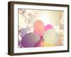 A Person Holding Multi Colored Balloons Done with a Retro Vintage Instagram Filter Effect-graphicphoto-Framed Photographic Print